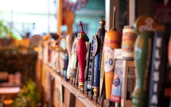 Variety of beer taps displayed